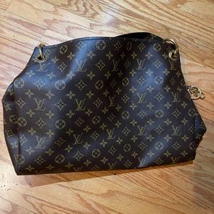 Excellent condition LV Artsy MM handbag .